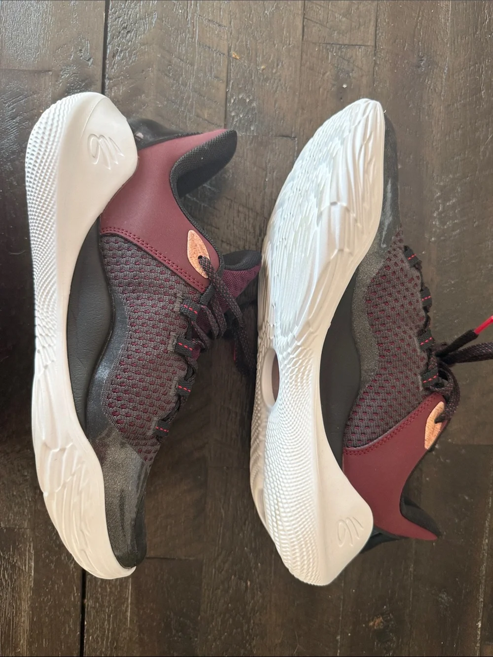 Under Armour Men's Athletic Shoes Curry 11 in Black and Burgundy